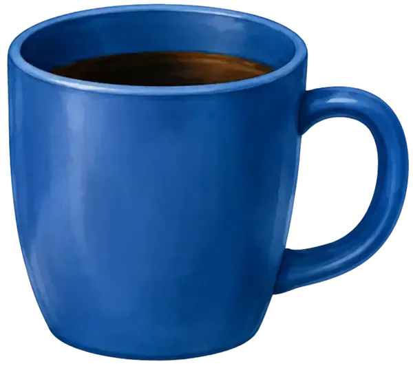 Tasse bleue posée près d’un espace d’étude.